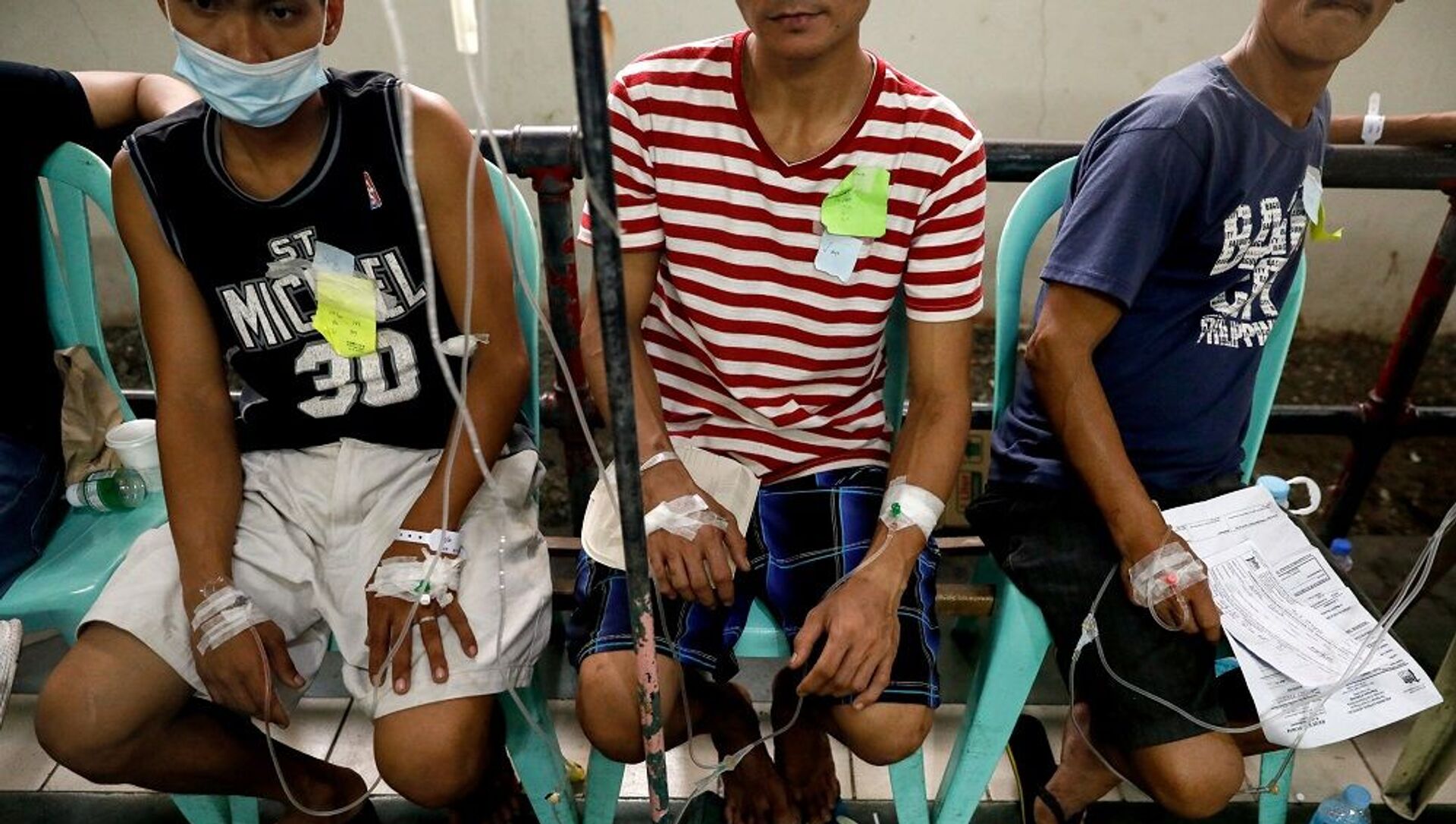 At the Philippine General Hospital in Manila's emergency ward, patients who became ill after drinking coconut wine are treated.